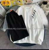 White sweatshirt shoulder paws and black flapper (track suit)t